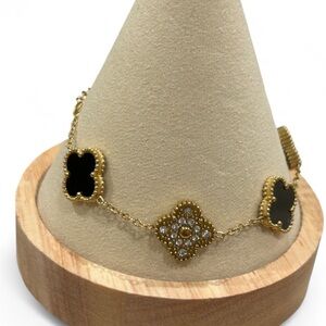 Elegant Gold and Black Bracelet